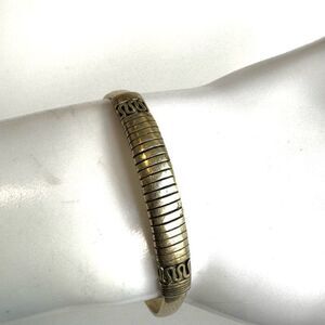 Gold tone etched open cuff bracelet